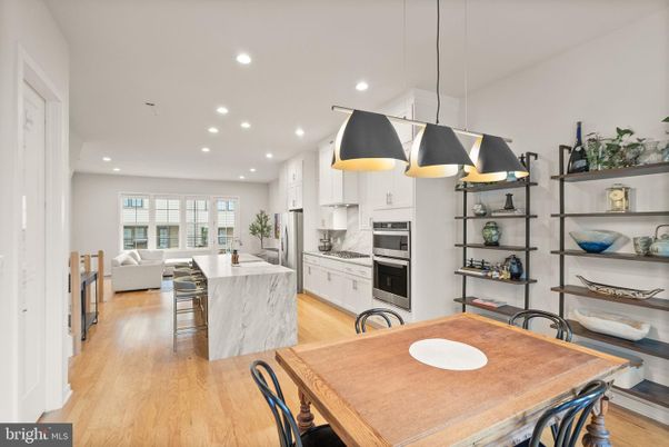 Dining room, Interior, Kitchen, Living room, Pendant Lights, Recessed Lighting, Stainless Steel Appliances, Wood Texture Flooring