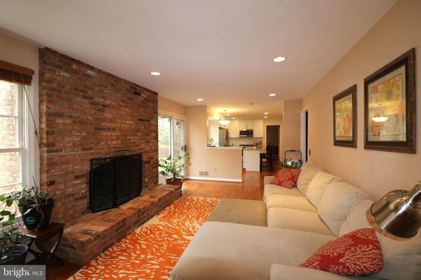 Fireplace, Interior, Kitchen, Living room, Recessed Lighting, Stone Walls, Wood Texture Flooring