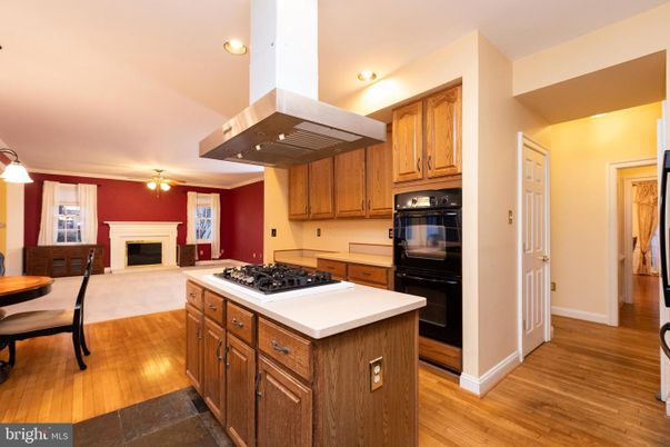Dining room, Fireplace, Interior, Kitchen, Pendant Lights, Recessed Lighting, Wood Texture Flooring