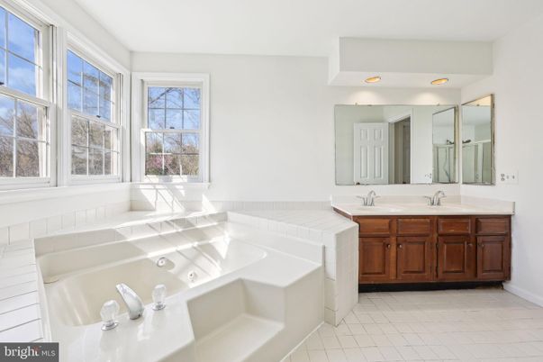 Bathroom, Dual Sink Vanities, Interior, Recessed Lighting, Tile Countertops