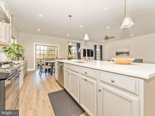 Dining room, Interior, Kitchen, Pendant Lights, Recessed Lighting, Stainless Steel Appliances, Wood Texture Flooring