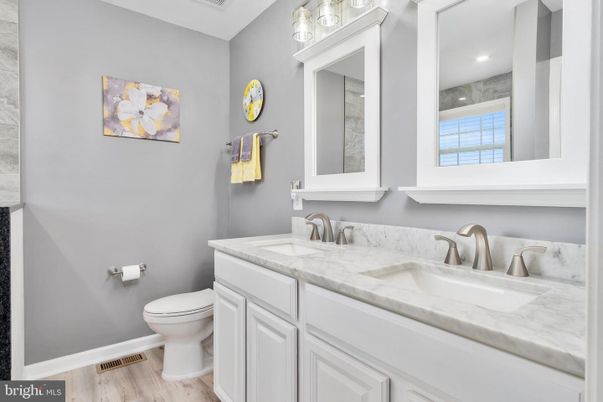 Bathroom, Dual Sink Vanities, Interior, Recessed Lighting, Wood Texture Flooring