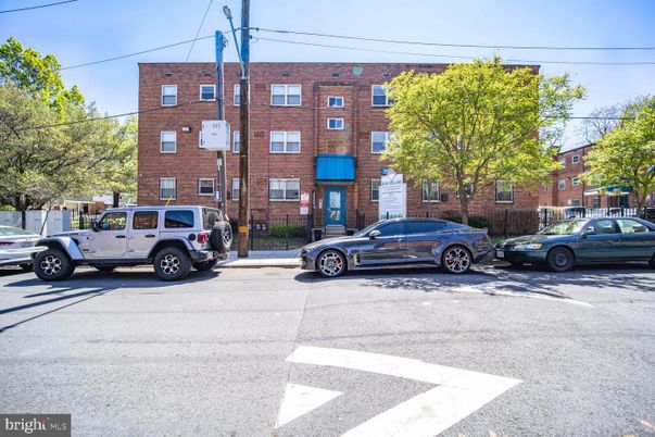 Exterior, Facade, Brick Facade, Condo Building