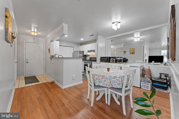Dining room, Interior, Kitchen, Recessed Lighting, Stainless Steel Appliances, Wood Texture Flooring