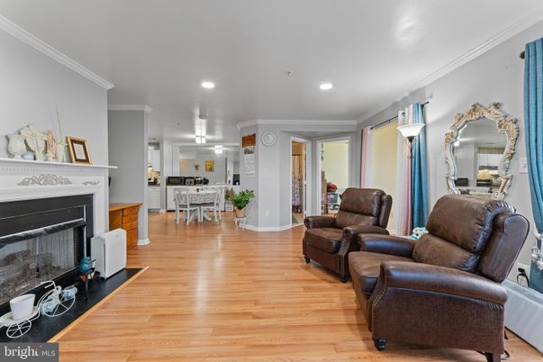 Dining room, Fireplace, Interior, Living room, Recessed Lighting, Wood Texture Flooring
