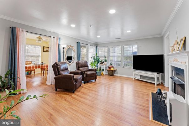Dining room, Fireplace, Interior, Living room, Recessed Lighting, Wood Texture Flooring