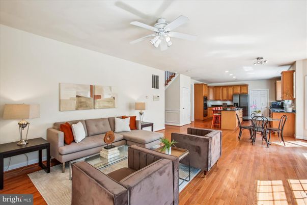 Dining room, Interior, Kitchen, Living room, Recessed Lighting, Stainless Steel Appliances, Wood Texture Flooring