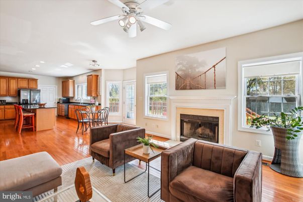 Dining room, Fireplace, Interior, Kitchen, Living room, Recessed Lighting, Wood Texture Flooring