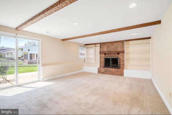 Empty room, Fireplace, Interior, Recessed Lighting, Stone Walls, Wooden Beams