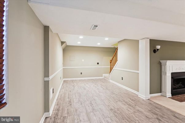 Empty room, Fireplace, Interior, Recessed Lighting, Wood Texture Flooring