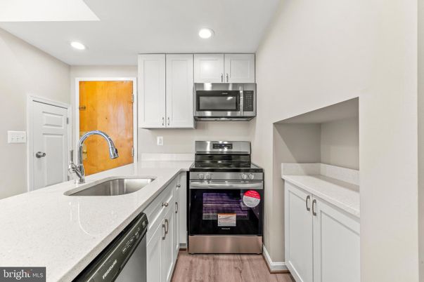 Interior, Kitchen, Recessed Lighting, Stainless Steel Appliances, Wood Texture Flooring