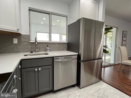 Interior, Kitchen, Marble, Recessed Lighting, Stainless Steel Appliances, Wood Texture Flooring