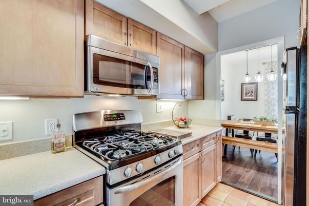 Dining room, Interior, Kitchen, Pendant Lights, Stainless Steel Appliances, Wood Texture Flooring