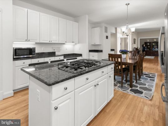 Chandelier, Dining room, Interior, Kitchen, Pendant Lights, Stainless Steel Appliances, Wood Texture Flooring