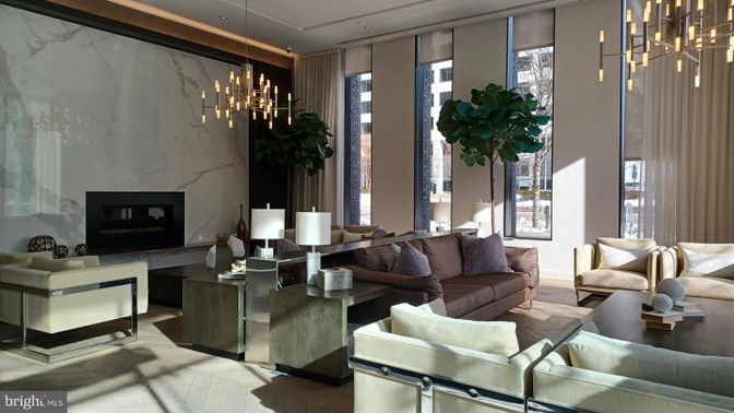Fireplace, Interior, Living room, Marble Walls, Pendant Lights, Recessed Lighting, Wood Texture Flooring