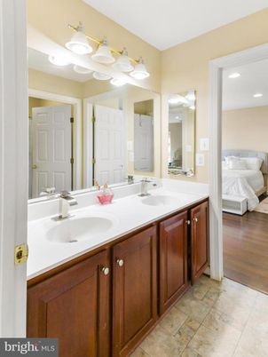 Bathroom, Bedroom, Dual Sink Vanities, Interior, Recessed Lighting, Wood Texture Flooring