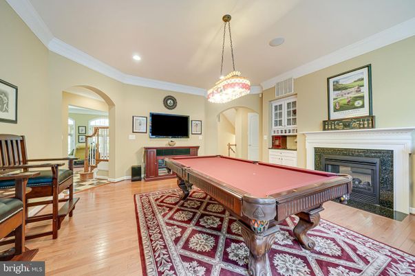 Billiard Table, Fireplace, Game Room, Interior, Pendant Lights, Recessed Lighting, Wood Texture Flooring
