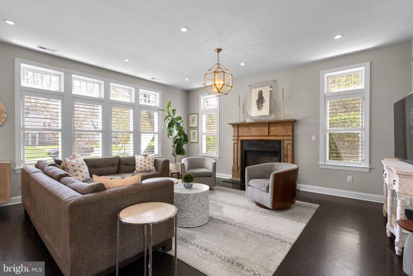 Chandelier, Fireplace, Interior, Living room, Pendant Lights, Recessed Lighting, Wood Texture Flooring