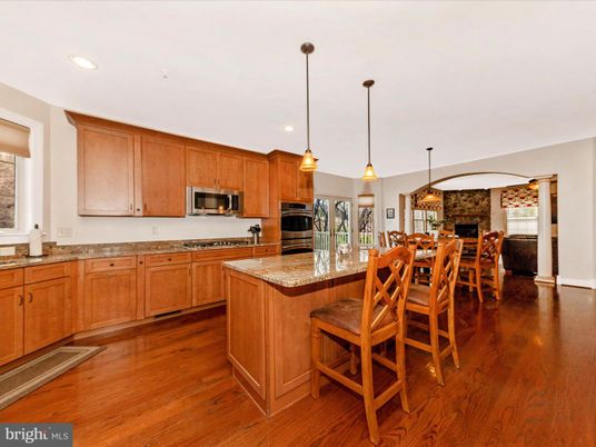 Dining room, Fireplace, Interior, Kitchen, Pendant Lights, Recessed Lighting, Stainless Steel Appliances, Wood Texture Flooring