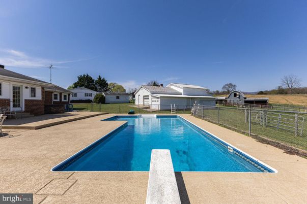 Exterior, Pool, Solar Panels