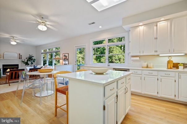 Dining room, Fireplace, Interior, Kitchen, Recessed Lighting, Wood Texture Flooring