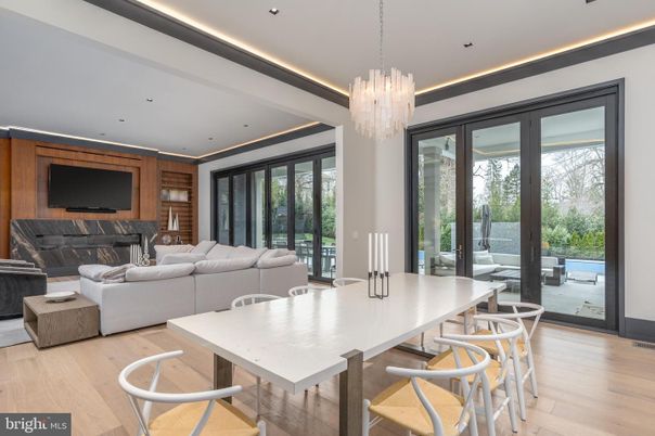 Chandelier, Dining room, Fireplace, Interior, Living room, Recessed Lighting, Wood Texture Flooring, Wooden Walls