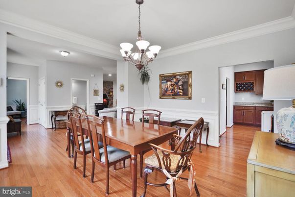 Chandelier, Dining room, Fireplace, Interior, Wood Texture Flooring