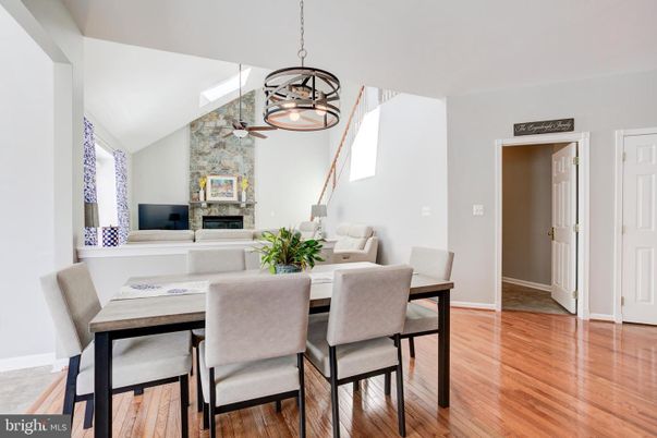 Dining room, Fireplace, Interior, Pendant Lights, Stone Walls, Wood Texture Flooring