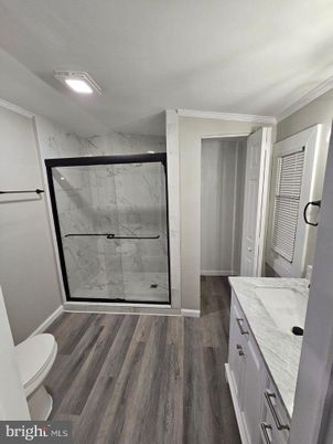 Bathroom, Glass Shower, Interior, Marble Walls, Wood Texture Flooring