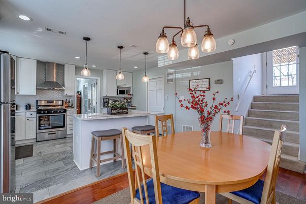 Dining room, Interior, Kitchen, Marble, Pendant Lights, Recessed Lighting, Stainless Steel Appliances, Wood Texture Flooring