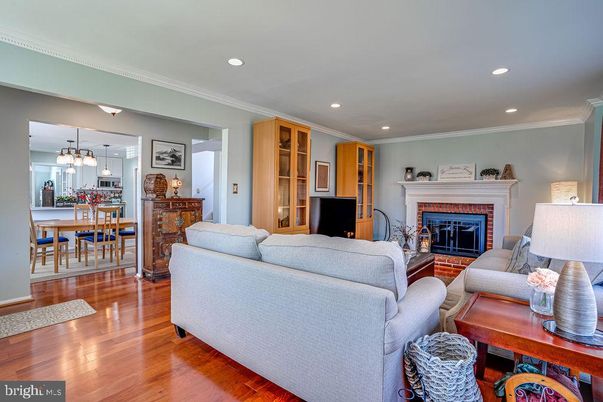 Dining room, Fireplace, Interior, Living room, Pendant Lights, Recessed Lighting, Wood Texture Flooring