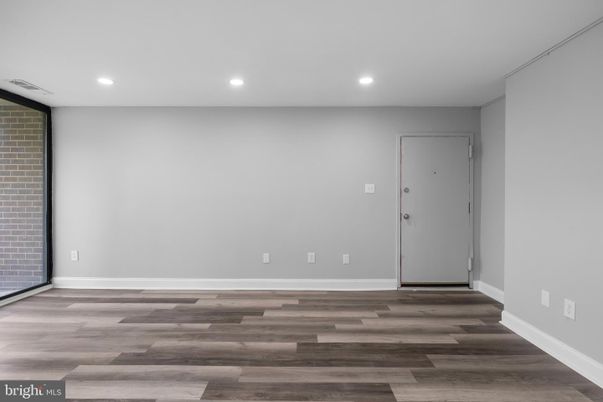Empty room, Interior, Recessed Lighting, Stone Walls, Wood Texture Flooring