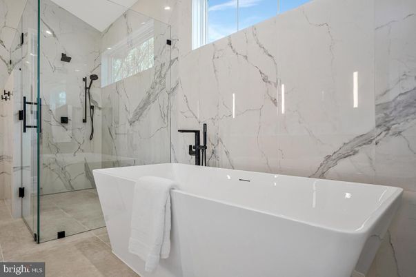 Bathroom, Free Standing Baths, Glass Shower, Interior, Marble Walls, Recessed Lighting
