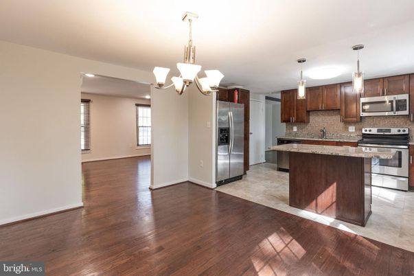 Chandelier, Interior, Kitchen, Pendant Lights, Recessed Lighting, Stainless Steel Appliances, Wood Texture Flooring