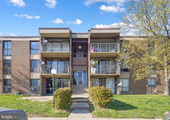Exterior, Facade, Brick Facade, Condo Building