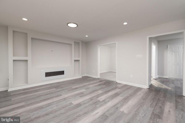 Empty room, Fireplace, Interior, Recessed Lighting, Wood Texture Flooring