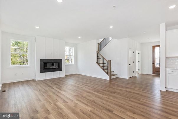 Empty room, Fireplace, Interior, Recessed Lighting, Wood Texture Flooring