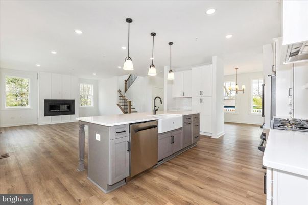 Chandelier, Fireplace, Interior, Kitchen, Pendant Lights, Recessed Lighting, Wood Texture Flooring