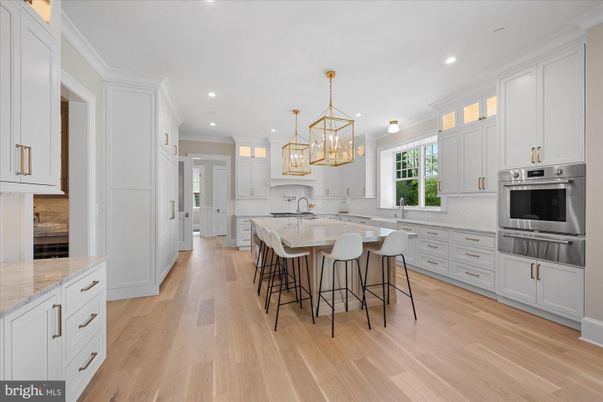 Chandelier, Interior, Kitchen, Pendant Lights, Recessed Lighting, Stainless Steel Appliances, Wood Texture Flooring