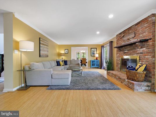 Fireplace, Interior, Living room, Recessed Lighting, Stone Walls, Wood Texture Flooring