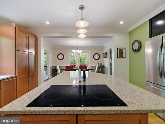 Chandelier, Dining room, Interior, Kitchen, Pendant Lights, Recessed Lighting, Stainless Steel Appliances, Wood Texture Flooring