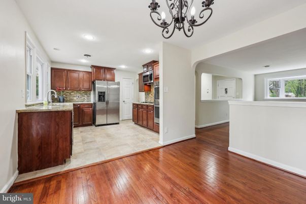 Chandelier, Interior, Kitchen, Recessed Lighting, Stainless Steel Appliances, Wood Texture Flooring