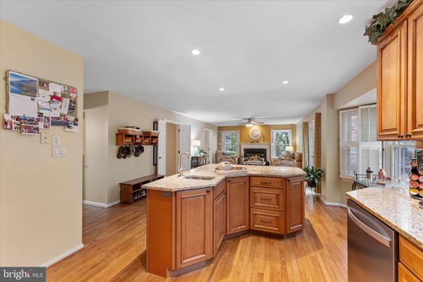 Fireplace, Interior, Kitchen, Recessed Lighting, Wood Texture Flooring