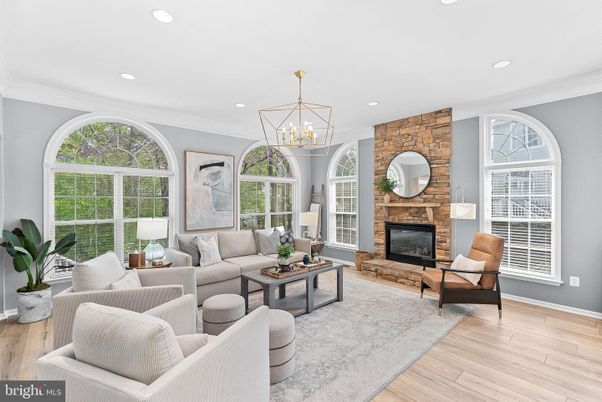 Fireplace, Interior, Living room, Recessed Lighting, Stone Walls, Wood Texture Flooring