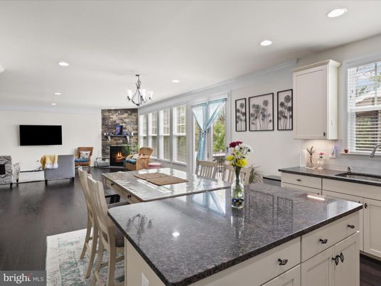 Dining room, Fireplace, Interior, Kitchen, Living room, Pendant Lights, Recessed Lighting, Wood Texture Flooring