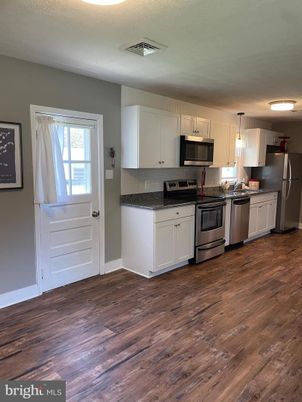 Interior, Kitchen, Pendant Lights, Stainless Steel Appliances, Wood Texture Flooring