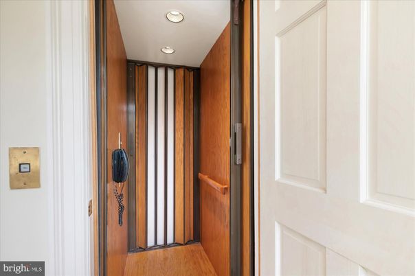 Elevator, Interior, Recessed Lighting, Wooden Walls