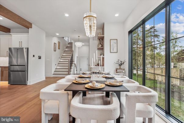 Chandelier, Dining room, Interior, Kitchen, Recessed Lighting, Stainless Steel Appliances, Wooden Beams, Wood Texture Flooring
