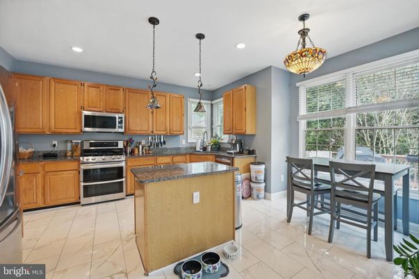 Dining room, Interior, Kitchen, Marble, Pendant Lights, Recessed Lighting, Stainless Steel Appliances