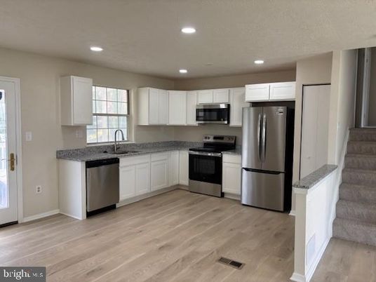 Interior, Kitchen, Recessed Lighting, Stainless Steel Appliances, Wood Texture Flooring